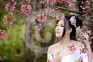 Asian woman wearing traditional Japanese kimono