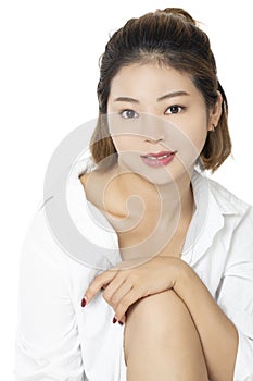 Asian woman wearing a white shirt on white backround