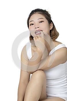 Asian woman wearing a white shirt on white backround