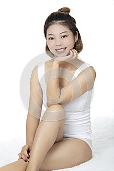 Asian woman wearing a white shirt on white backround