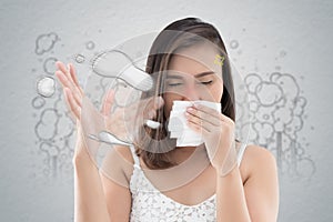 Asian woman in white dress catch her nose because of a bad smell