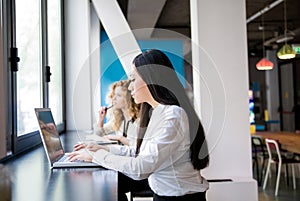 Asian woman working with laptop