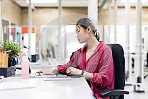 Asian Woman Working in the Office