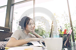 Asian woman working online at home concept.