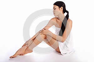 Asian woman wrapped in a towel