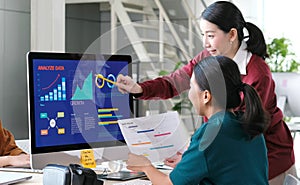 Asian women discussing about business plan, Asia female team analyze business data at office