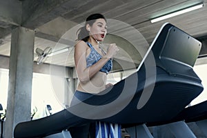 Asian women exercise runner at gym fitness. healthy lifestyle