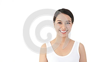 Asian women have beautiful smiles, healthy teeth, strong and clean white. She is wearing a white shirt, white background. Dental c