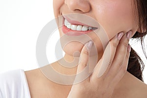 Asian women have beautiful smiles, healthy teeth and white teeth.