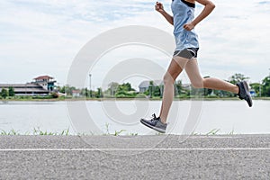 Asian women runners, She was running on the road in the morning