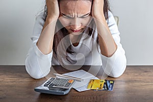 Asian women are stressed out of going into credit card debt