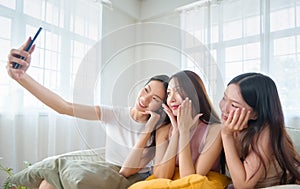 Asian Women taking a selfie