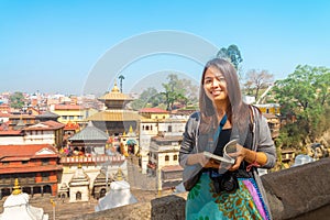 An asian women tourist visited the Pashupatinath Temple is a famous world heritage photo