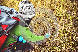 Asian women travel  nature. Travel relax.Backpack walk on the meadow in the forest. Thailand