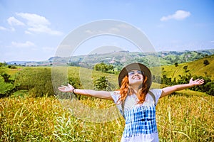 Asian women travel Rice fields green On the mountains in the holiday. happy and enjoying a beautiful nature. Rice fields Golden.