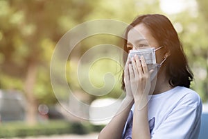 Asian women wear masks to protect The PM 2.5 pollution photo