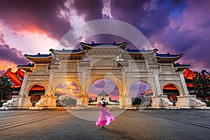 Asian women wearing dresses visit Gate of Chiang Kai-Shek Memorial Hall ,Taipei, Taiwan