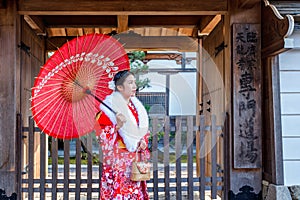 Asian women wearing japanese traditional kimono visiting the beautiful in Kyoto