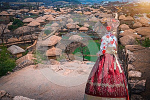 Asian women wearing traditional Korean clothes Hanbok visit an ancient village in the south of South Korea