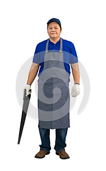 Asian worker man in blue shirt with apron and protective gloves hand holding saw isolated on white