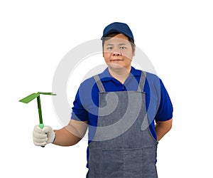 Asian worker man in blue shirt with apron and protective gloves hand holding Shoveling fork isolated on white