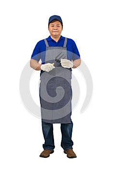 Asian worker man in blue shirt with apron and protective gloves hand holding Shoveling fork isolated on white