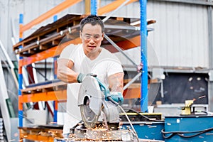 Asian worker in production plant on the factory