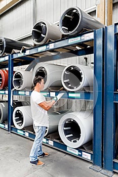 Asian worker in production plant on the factory