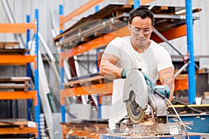 Asian worker in production plant on the factory floor