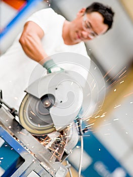 Asian worker in production plant on the factory floor