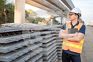 Asian worker showing thumb up at construction site