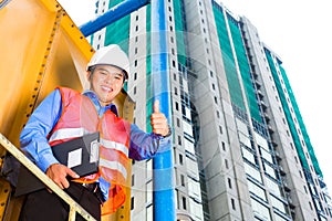 Asian worker or supervisor on building site