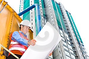 Asian worker or supervisor on building site