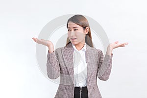 Asian working woman is smiling and shows her hands to present something.