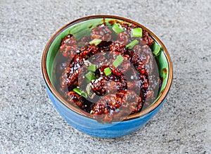 Asian xinhua special beef served in dish isolated on background top view of asian food