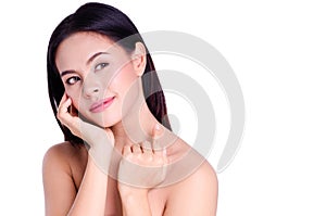 Asian young beautiful woman smiling and touching her face, isolated over white background. natural makeup, SPA therapy, skincare,