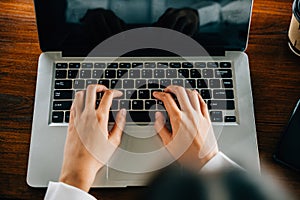 Asian young business woman lifestyle using laptop computer at cafe coffee shop