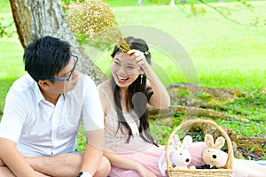 Asian young couple enjoyed outdoor nature