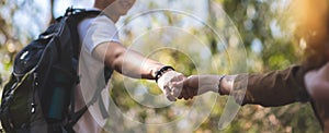 Asian Young Couple holding hands together over nature background