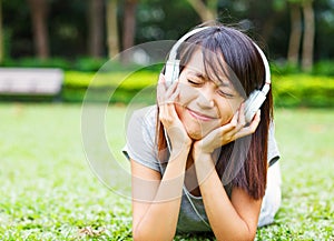 Asian young girl enjoy listen to music