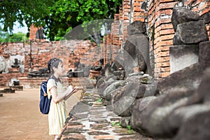 Asian young girl is study and learning antiquities,field trip,A photo