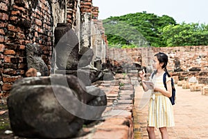 Asian young girl is study and learning antiquities,field trip,A photo