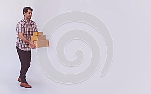 Asian young man holding box package, delivery man