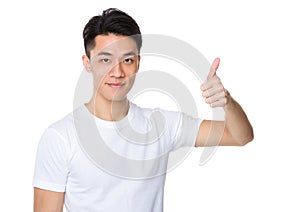 Asian young man with thumb up