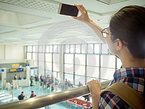 Asian young student standing on the airport