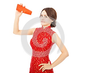 Asian young woman anger and holding a empty red envelope