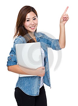 Asian young woman with clipboard and finger point up