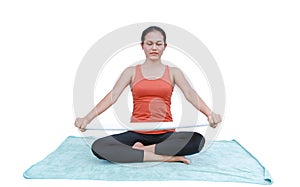 Asian Young woman doing yoga exercises isolated on white background