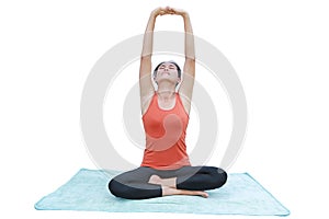 Asian Young woman doing yoga exercises isolated on white background