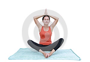 Asian Young woman doing yoga exercises on white background